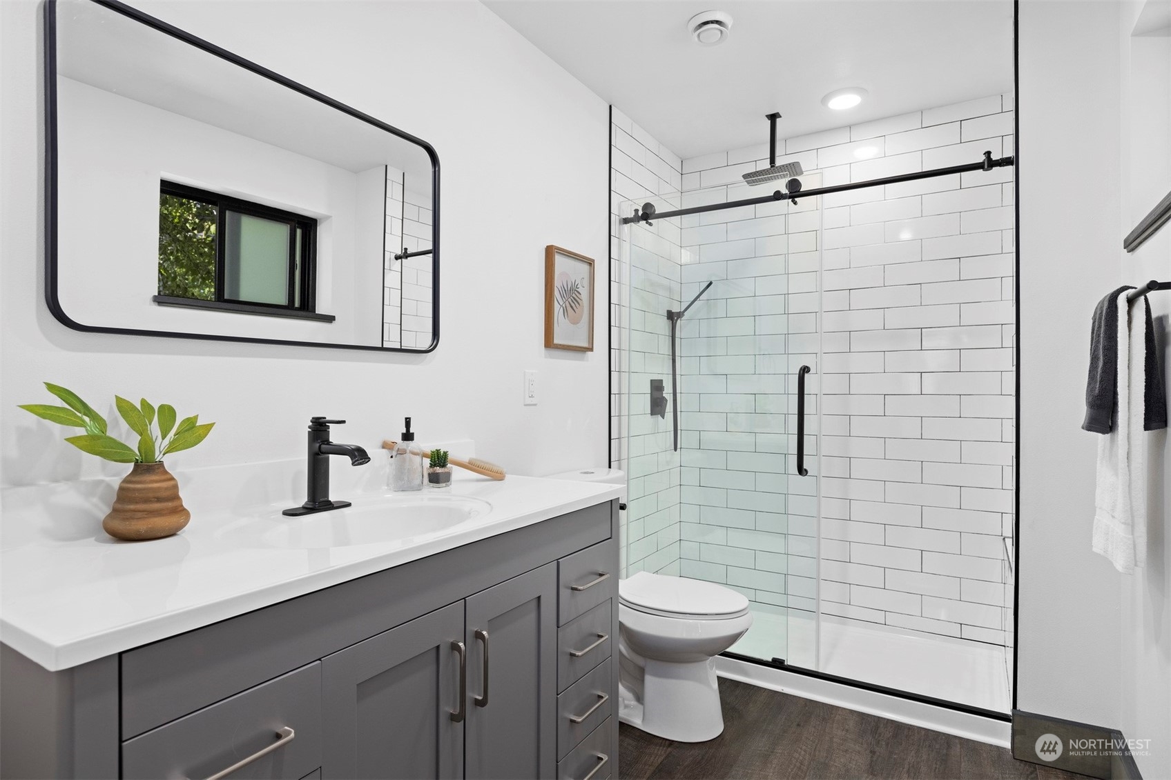 2415 Pacific Street Bellingham, WA 98229 - Photo 23 of 40 a bathroom with a toilet sink and shower