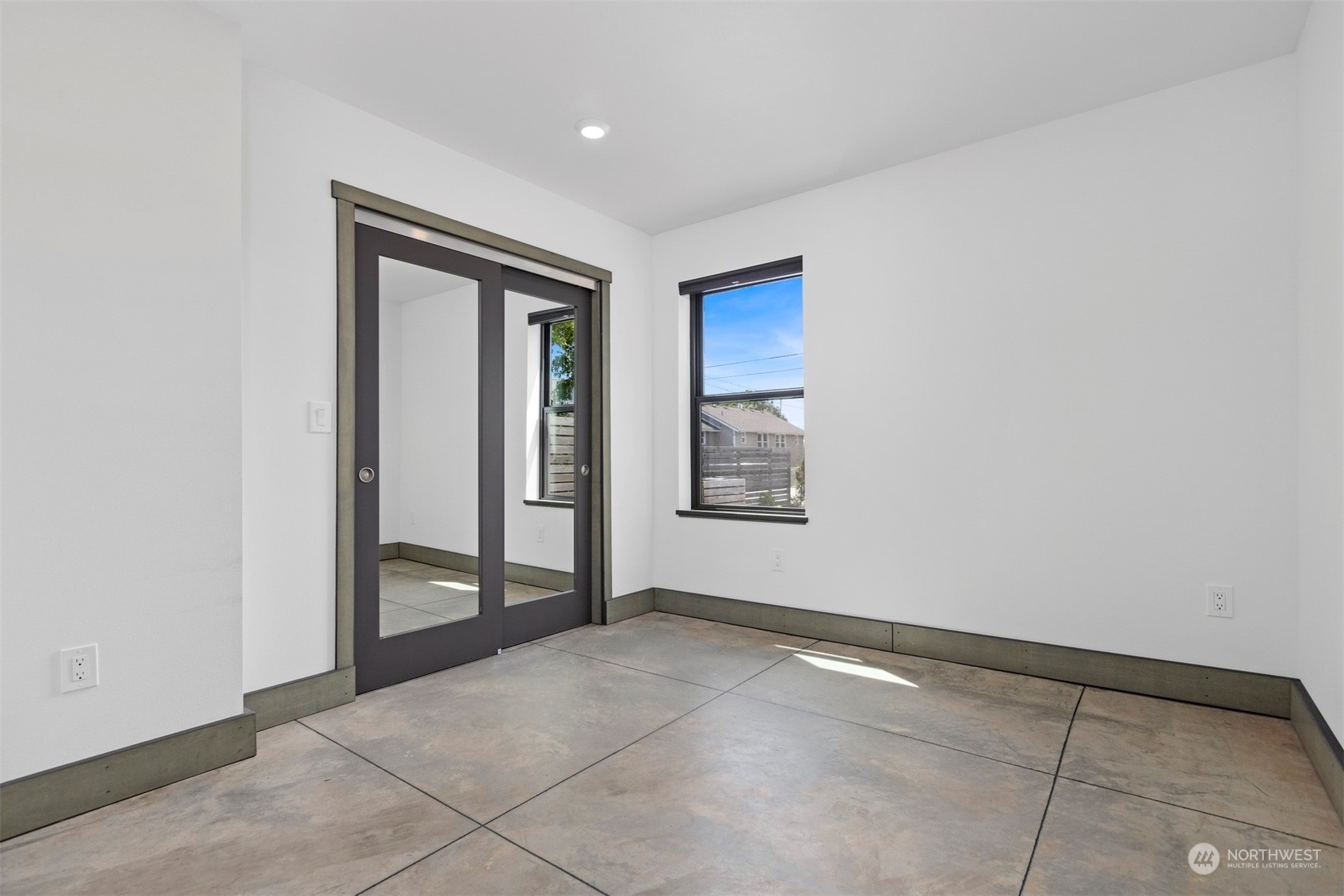2415 Pacific Street Bellingham, WA 98229 - Photo 32 of 40 an empty room with windows