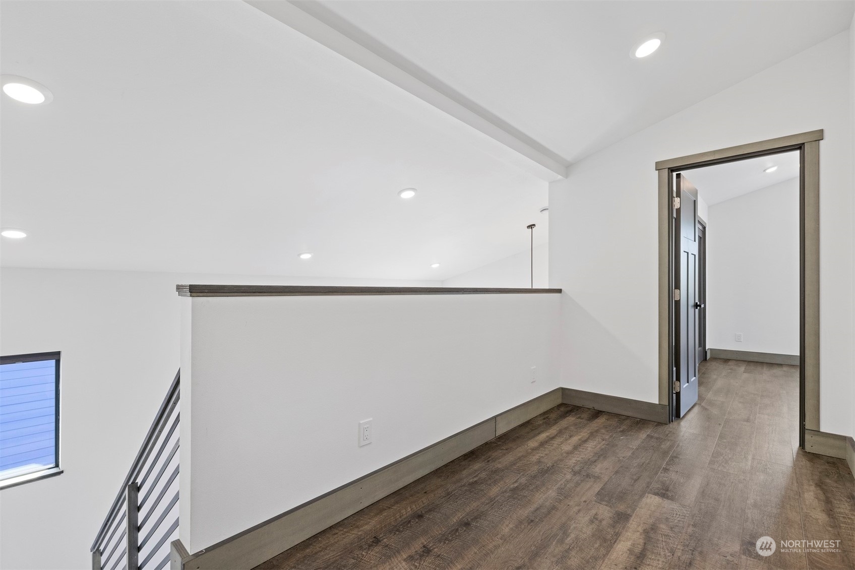 2415 Pacific Street Bellingham, WA 98229 - Photo 34 of 40 a view of an empty room with wooden floor and a window