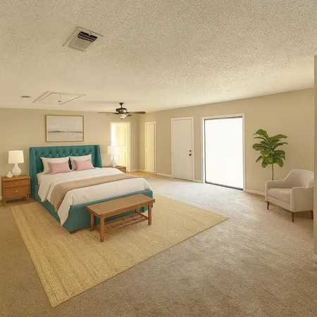 a bedroom with a bed and potted plant