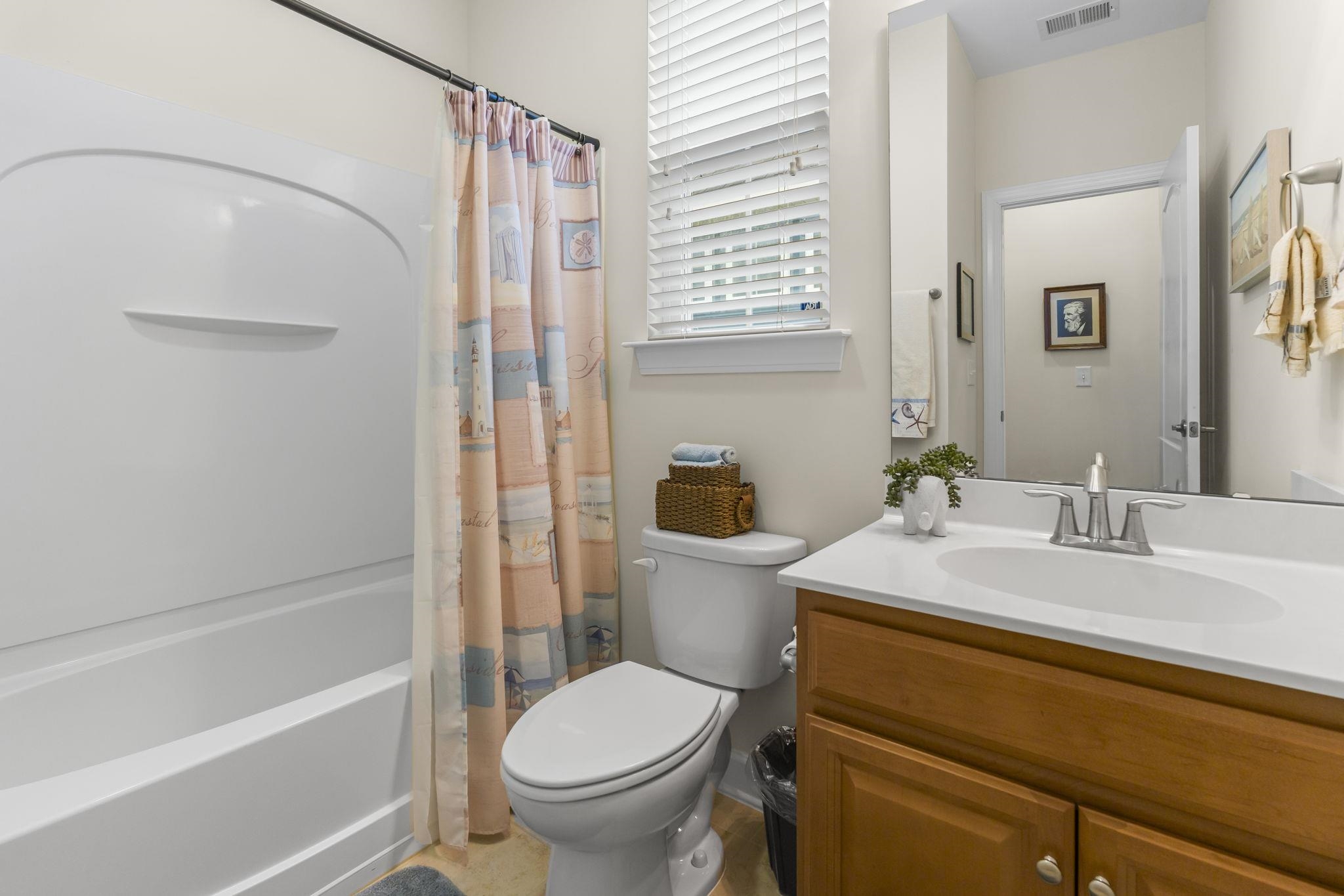 2015 Oxford Street Myrtle Beach, SC 29577 - Photo 25 of 40 Bathroom with shower / tub combo and vanity