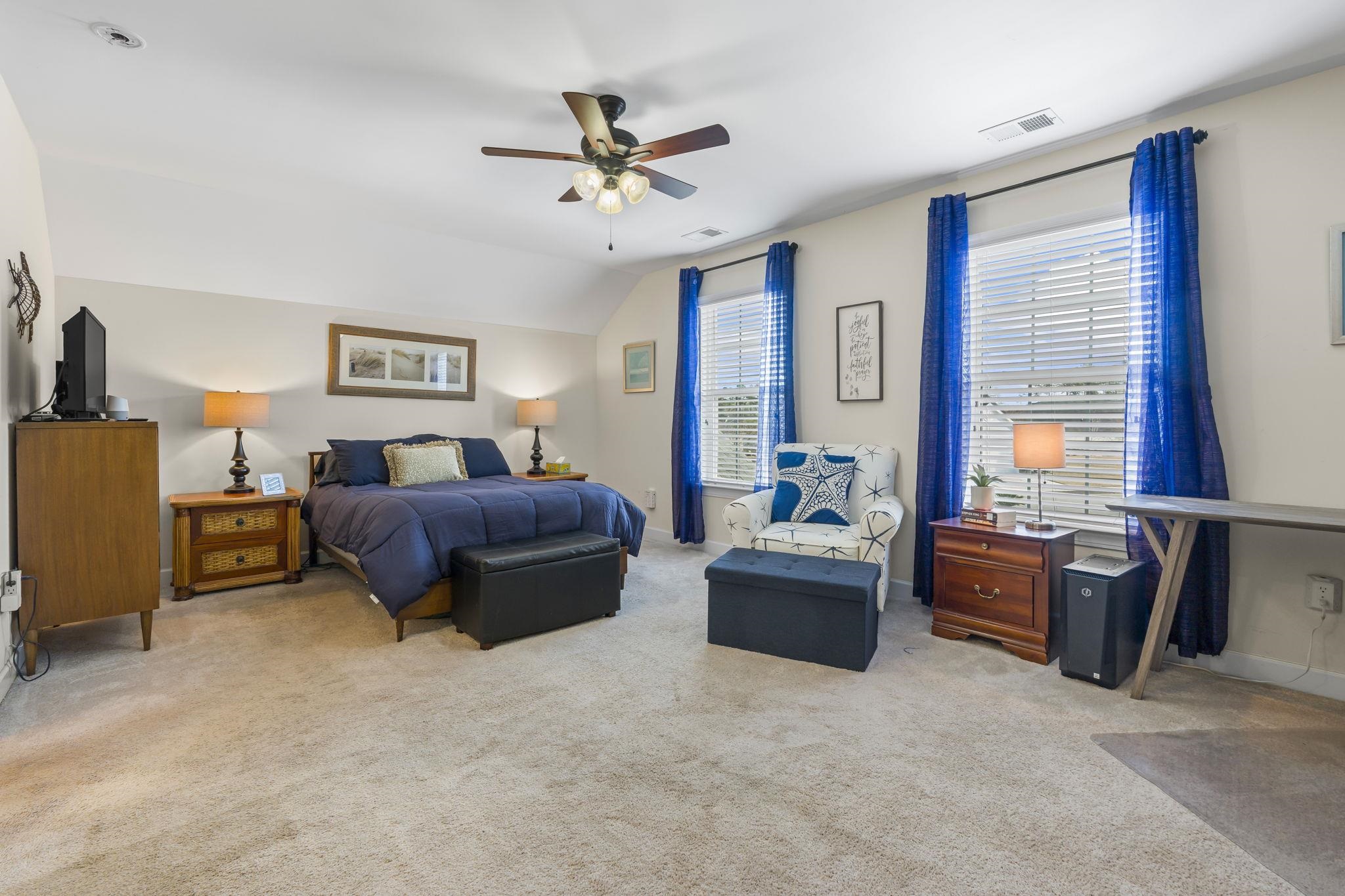 2015 Oxford Street Myrtle Beach, SC 29577 - Photo 26 of 40 Bedroom with light carpet, a ceiling fan, and vaulted ceiling