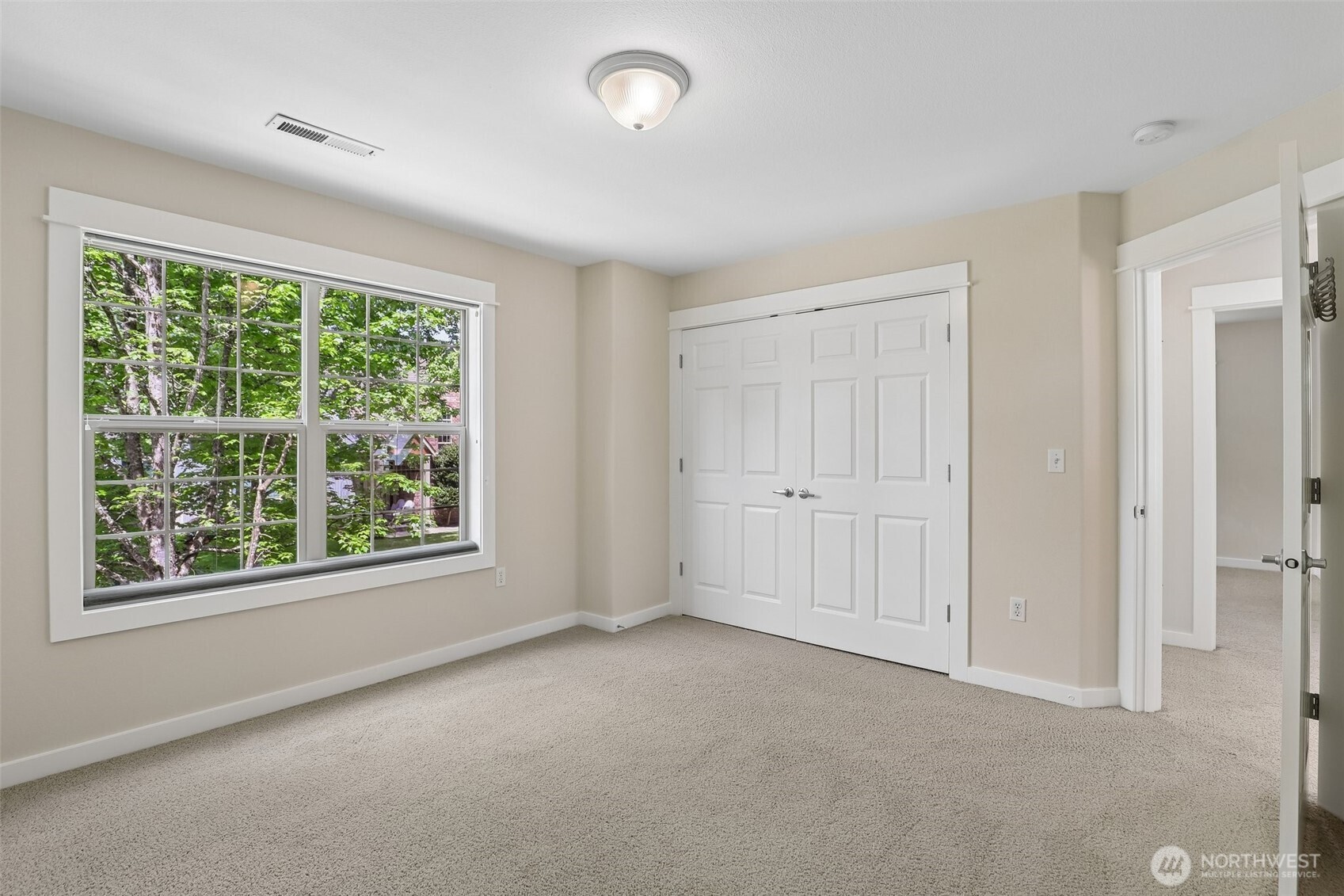 19709 Southeast 26th Way Camas, WA 98607 - Photo 30 of 36 an empty room with windows and closet area
