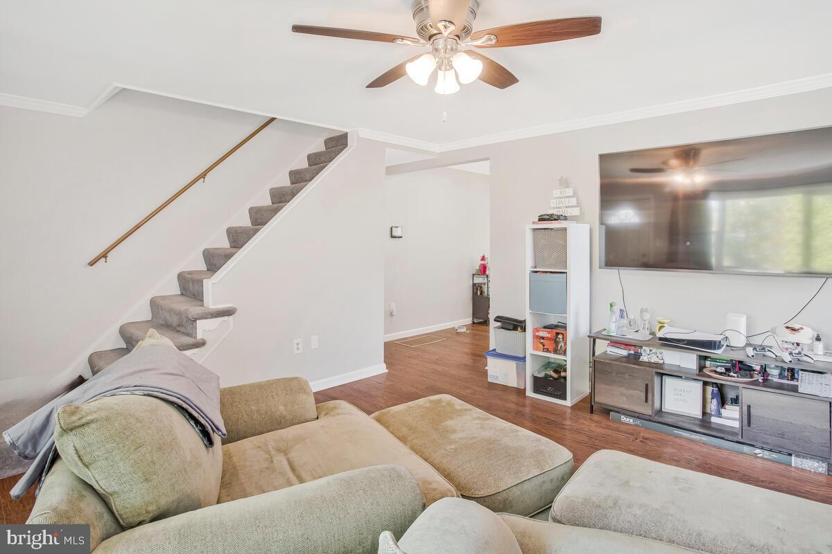 712 Seawall Road Baltimore, MD 21221 - Photo 9 of 36 Looking towards the stairs from Living Room