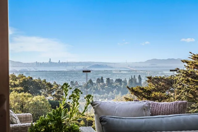 a view of a couch in front of a lake