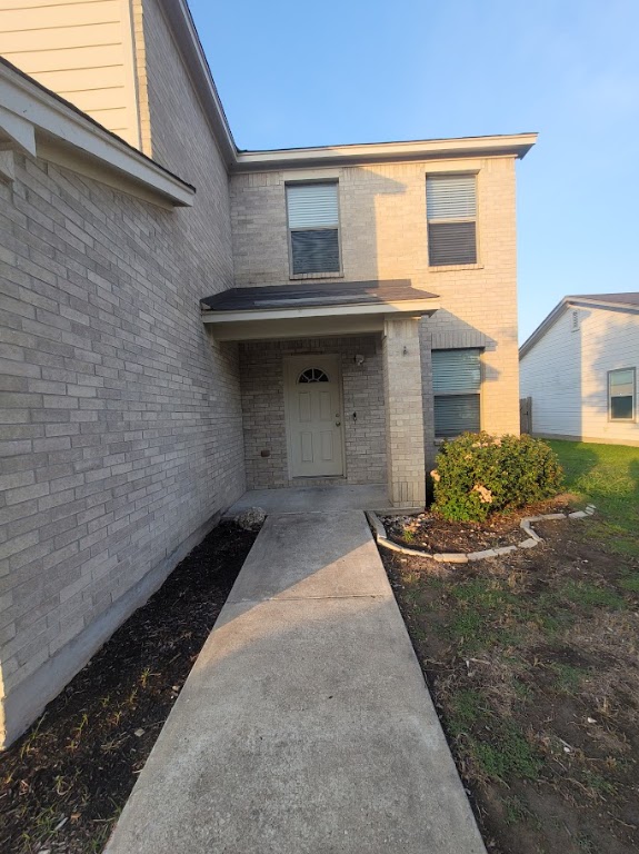 a front view of a house with garage