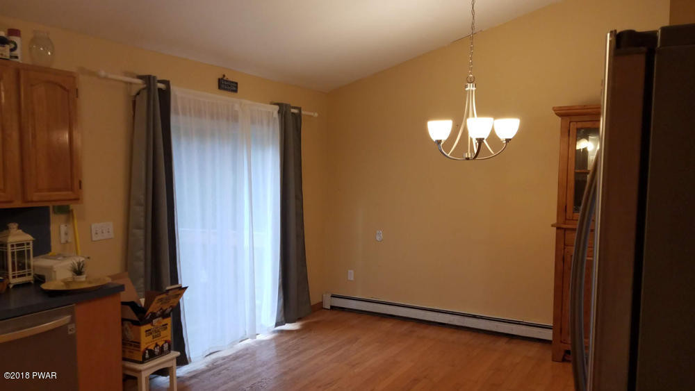 185 Fox Road Dingmans Ferry, PA 18328 - Photo 6 of 19 an empty room with a mirror