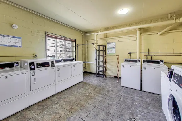 a utility room with cabinets