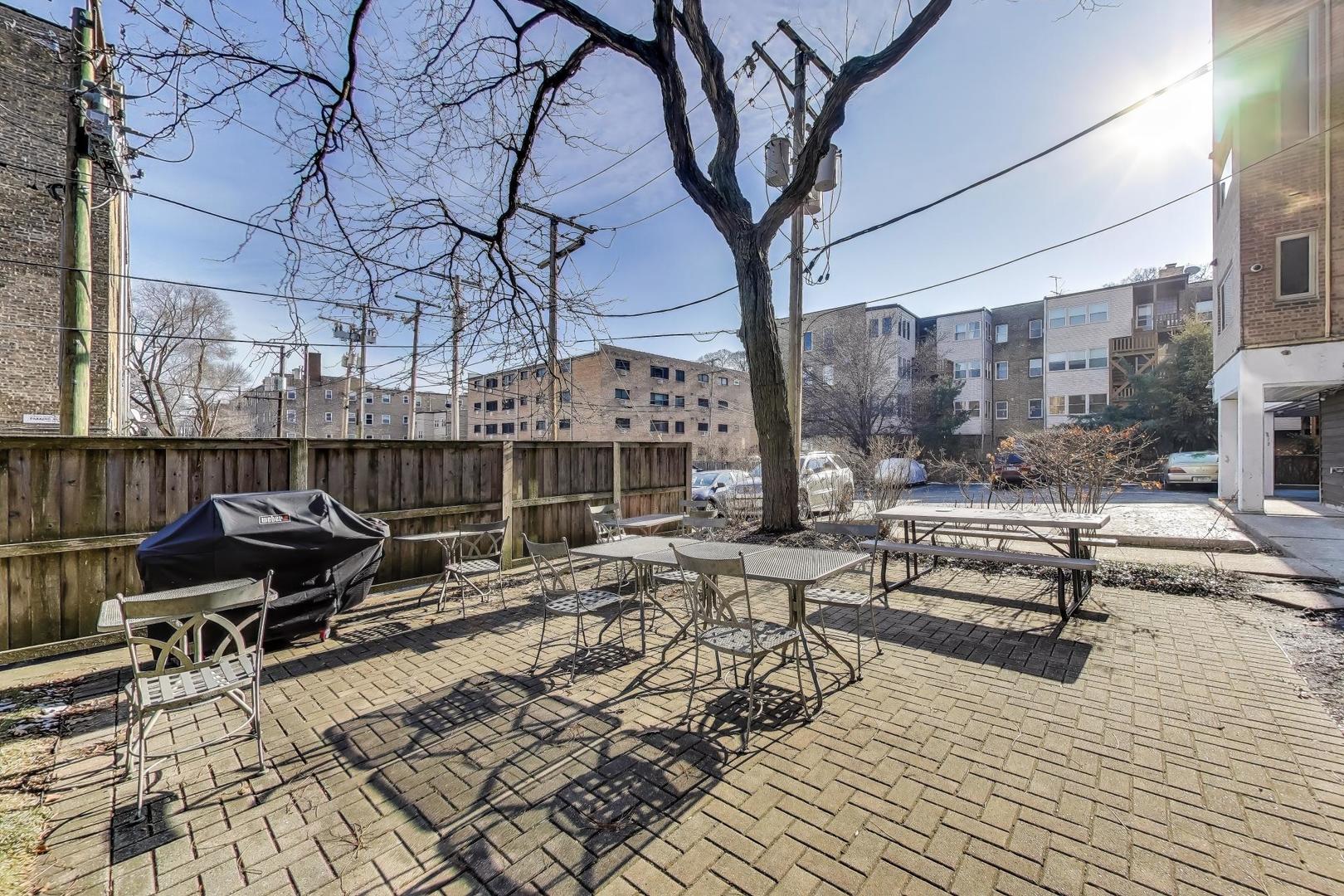 835 Ridge Avenue, Unit 205 Evanston, IL 60202 - Photo 15 of 18 a view of a backyard with sitting area