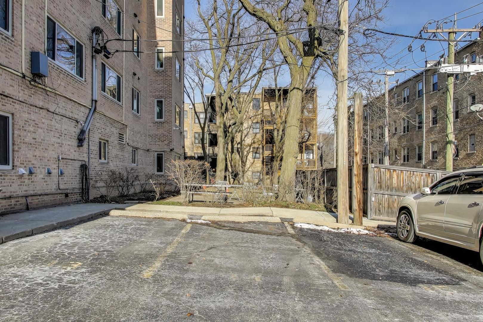835 Ridge Avenue, Unit 205 Evanston, IL 60202 - Photo 18 of 18 a view of a street with of cars