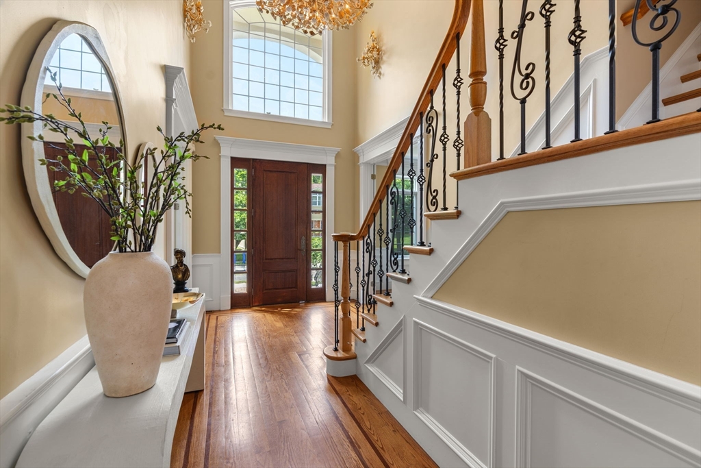 22 Scotney Road Newton, MA 02467 - Photo 6 of 42 a view of an entryway with wooden floor