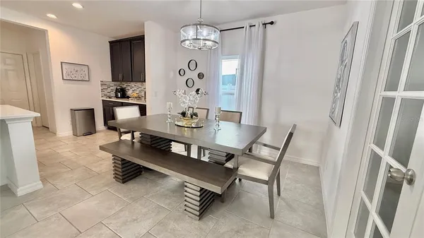 a view of a dining room with furniture