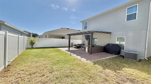 a house view with a backyard space