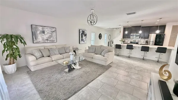 a living room with furniture and a view of living room