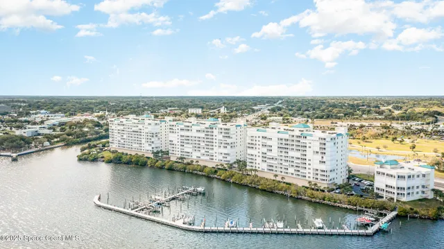 a view of a city and swimming pool