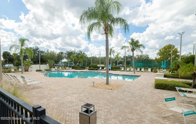 a view of a park with swings and slides