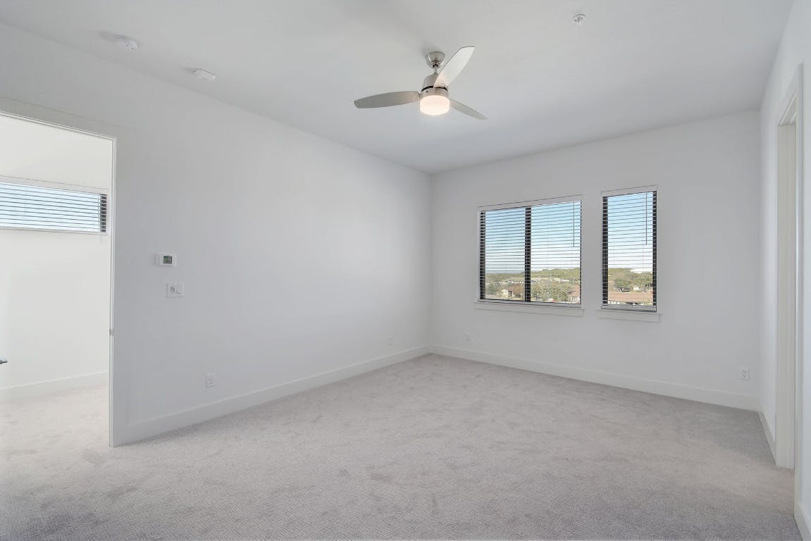 2050 Lohmans Spur Road, Unit 402 Austin, TX 78734 - Photo 20 of 39 a view of an empty room with a window
