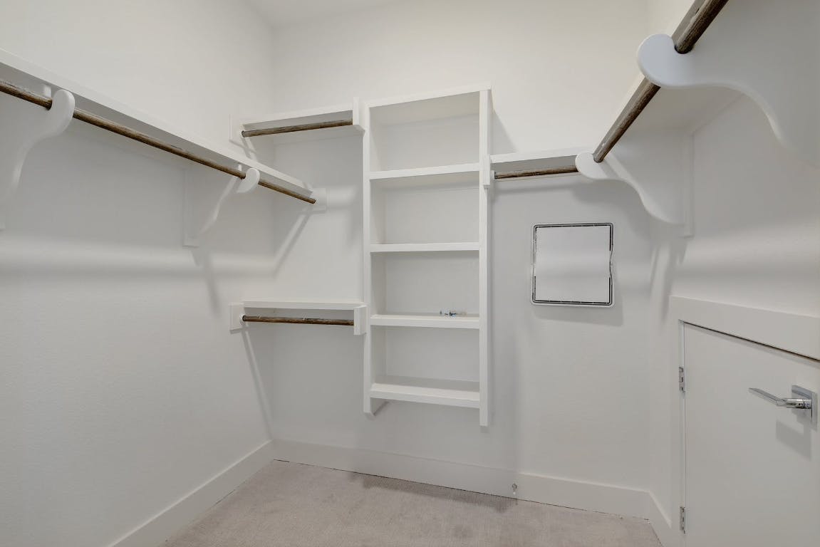 2050 Lohmans Spur Road, Unit 402 Austin, TX 78734 - Photo 24 of 39 a view of an empty walk in closet