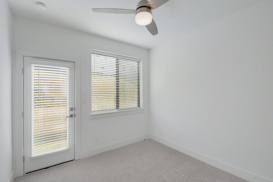 2050 Lohmans Spur Road, Unit 402 Austin, TX 78734 - Photo 28 of 39 an empty room with a window