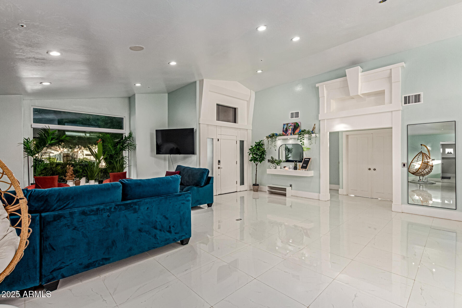 12528 North 78th Street Scottsdale, AZ 85260 - Photo 11 of 62 a living room with furniture and a flat screen tv