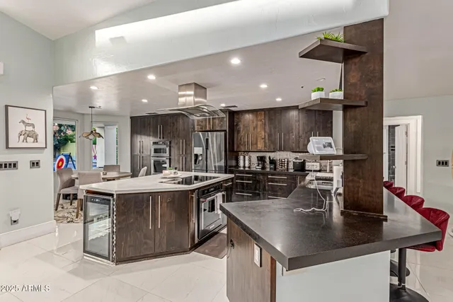 a bedroom with furniture and a potted plant