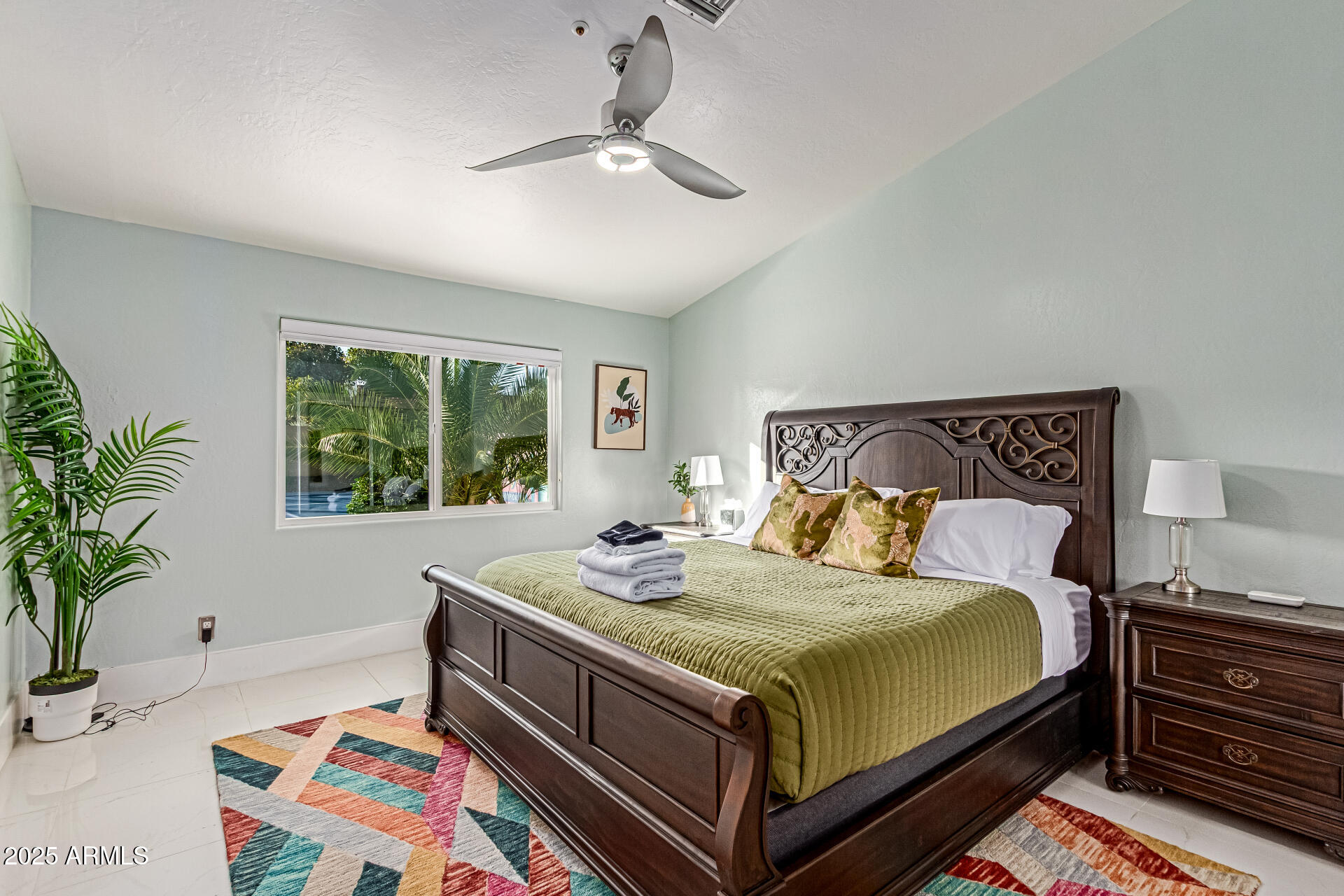 12528 North 78th Street Scottsdale, AZ 85260 - Photo 25 of 62 a bedroom with a bed and a window