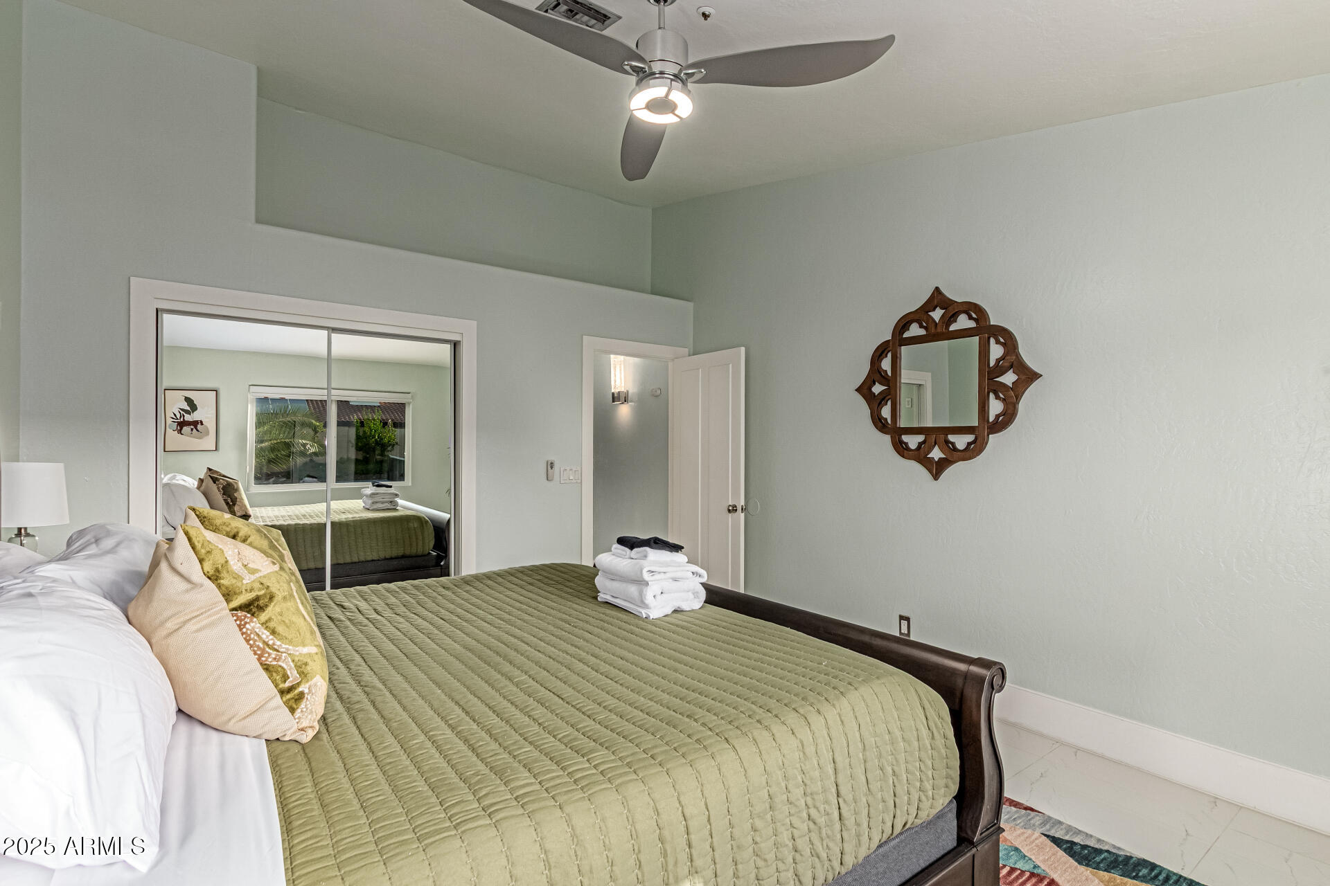 12528 North 78th Street Scottsdale, AZ 85260 - Photo 26 of 62 a bedroom with a large bed and a window
