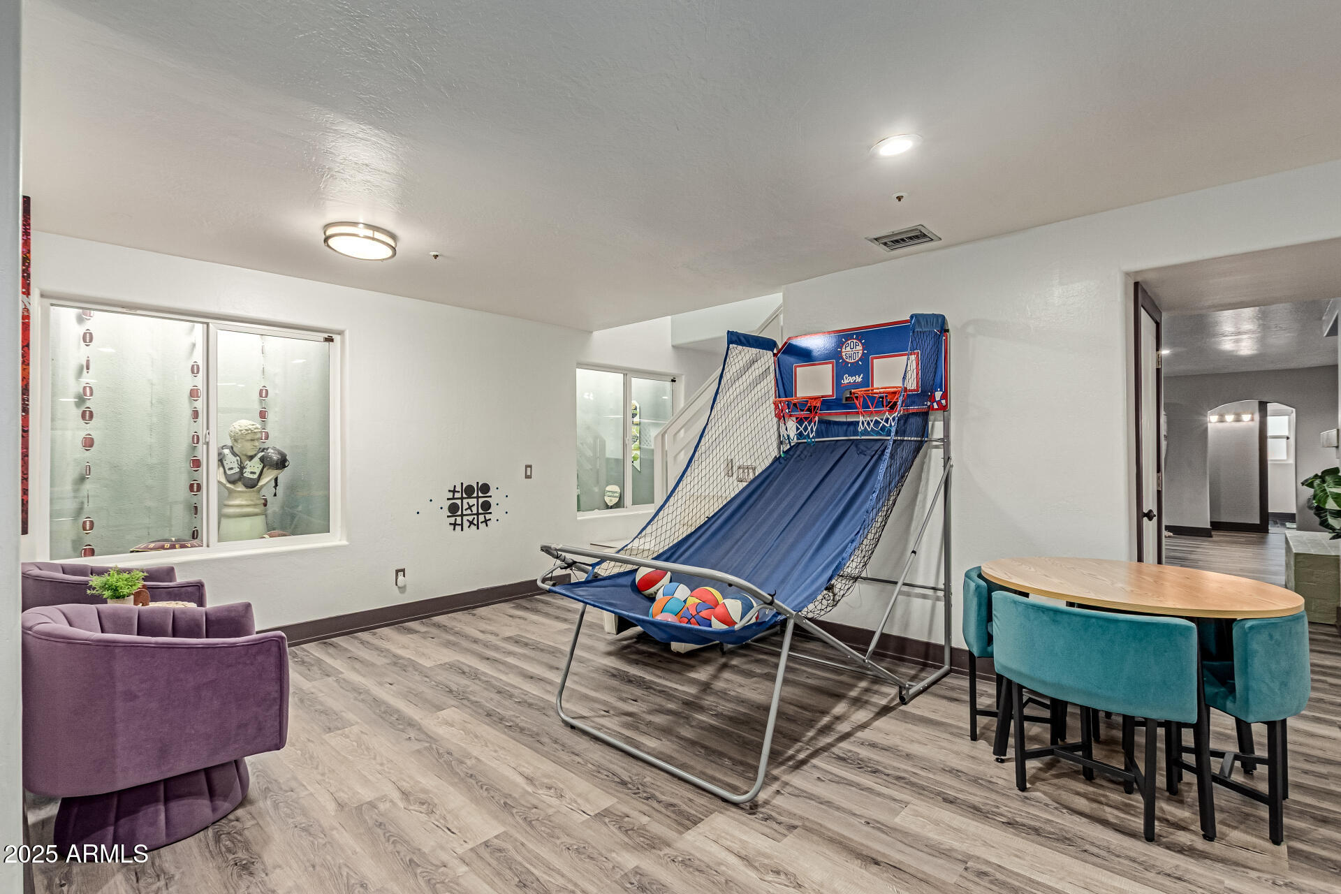 12528 North 78th Street Scottsdale, AZ 85260 - Photo 34 of 62 a living room with furniture and a wooden floor