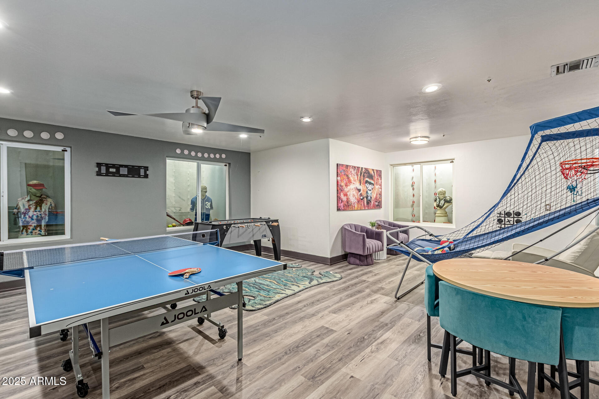 12528 North 78th Street Scottsdale, AZ 85260 - Photo 35 of 62 a living room with furniture pool table wooden floor and windows