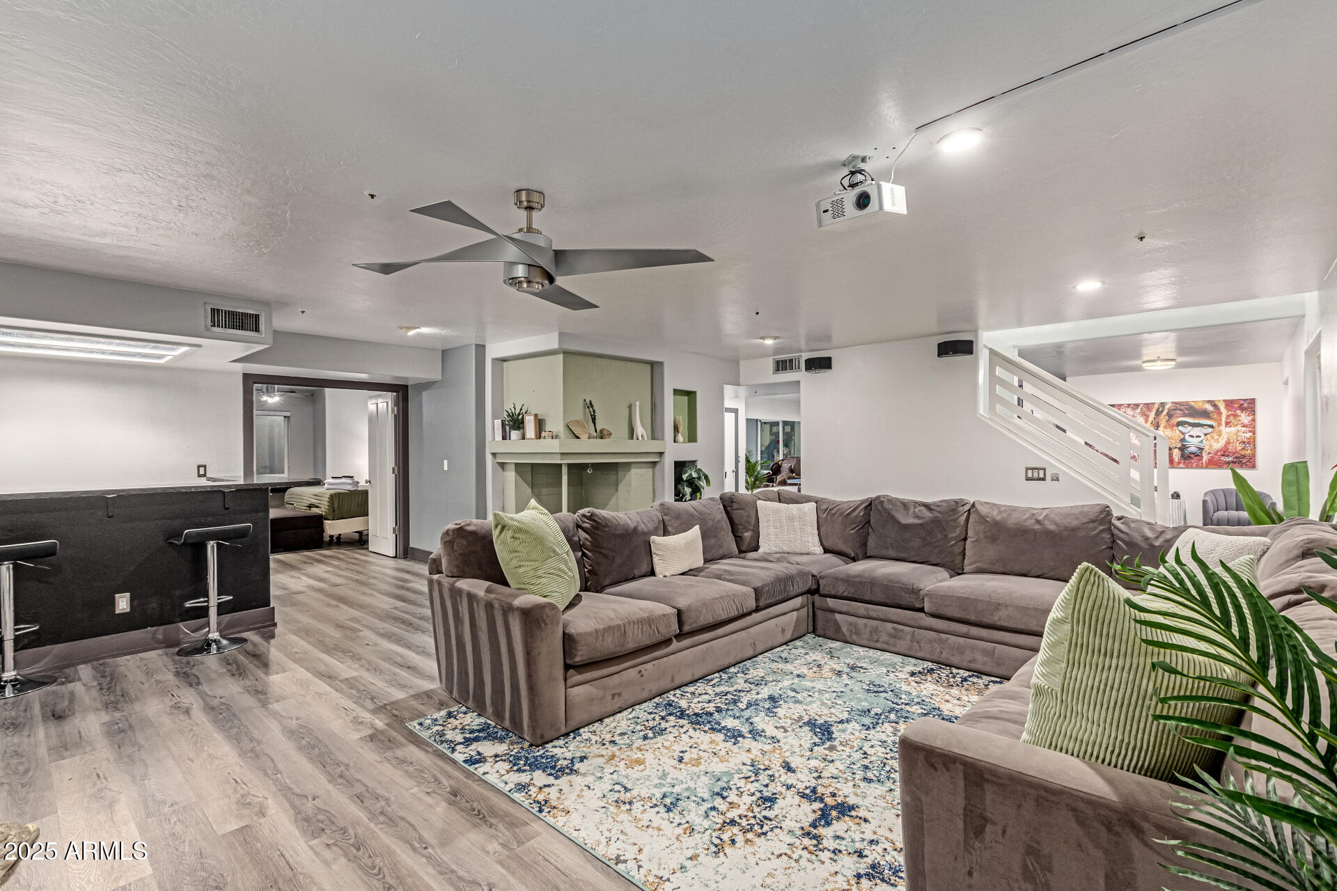 12528 North 78th Street Scottsdale, AZ 85260 - Photo 39 of 62 a living room with furniture and a wooden floor