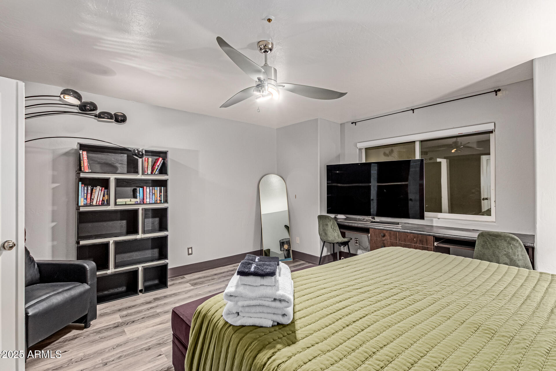 12528 North 78th Street Scottsdale, AZ 85260 - Photo 42 of 62 a bed room with a bed and a television