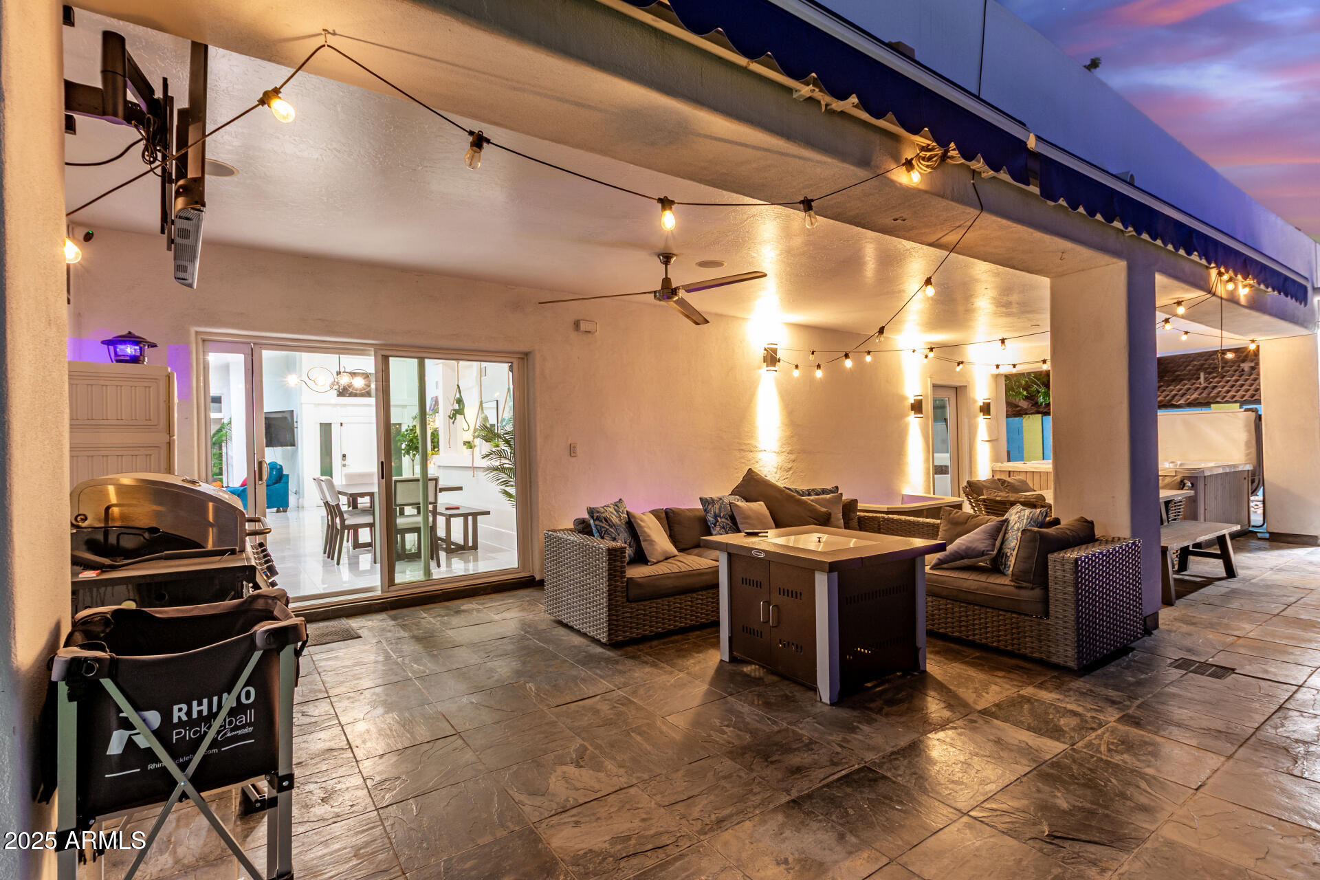 12528 North 78th Street Scottsdale, AZ 85260 - Photo 56 of 62 a living room with furniture and a floor to ceiling window