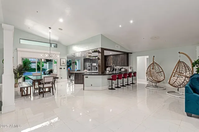 a kitchen with a table and chairs in it