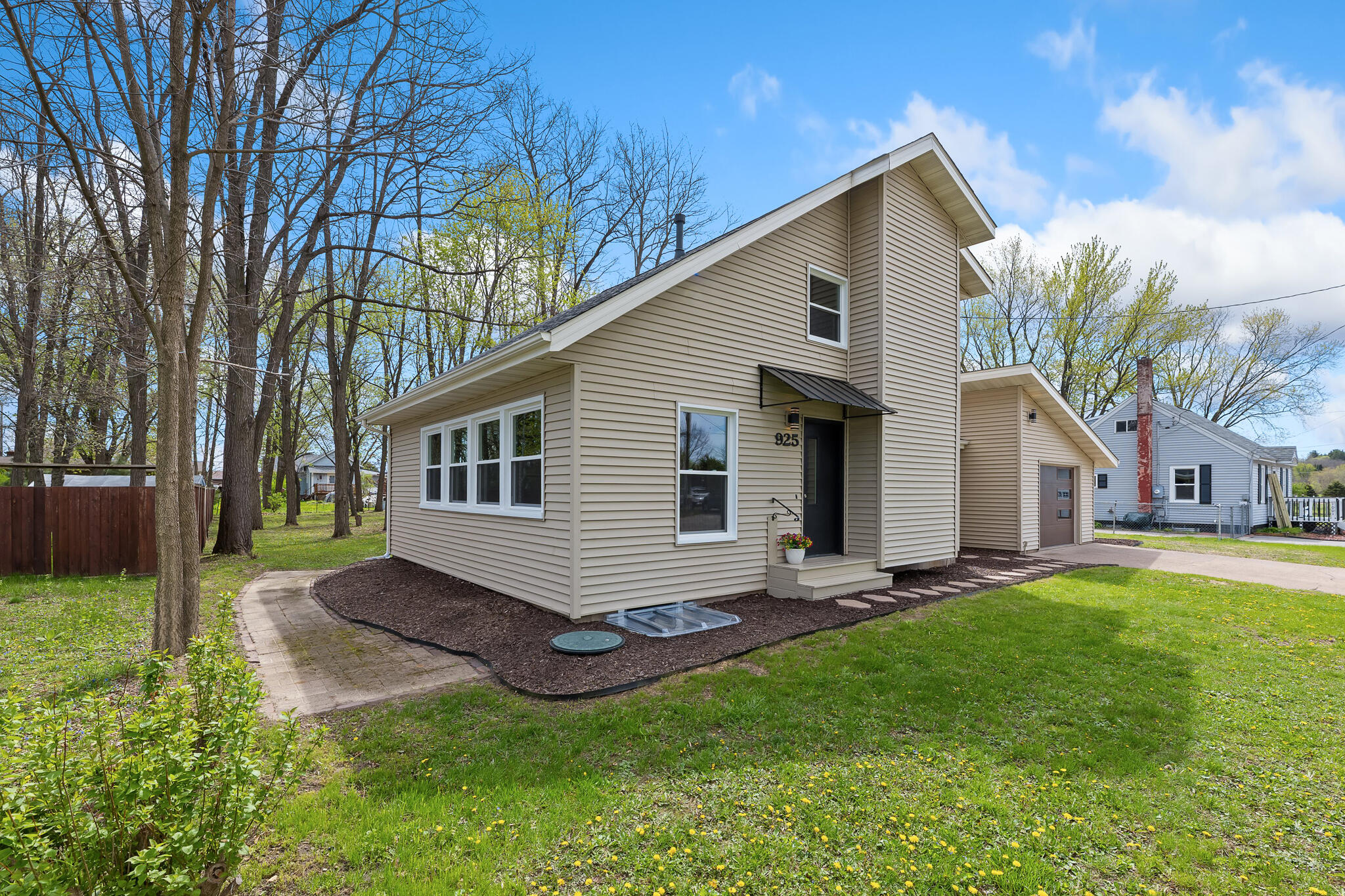 925 Mill Street Sparta, WI 54656 - Photo 5 of 46 5 FRONT WITH SIDEWALK TO BACK