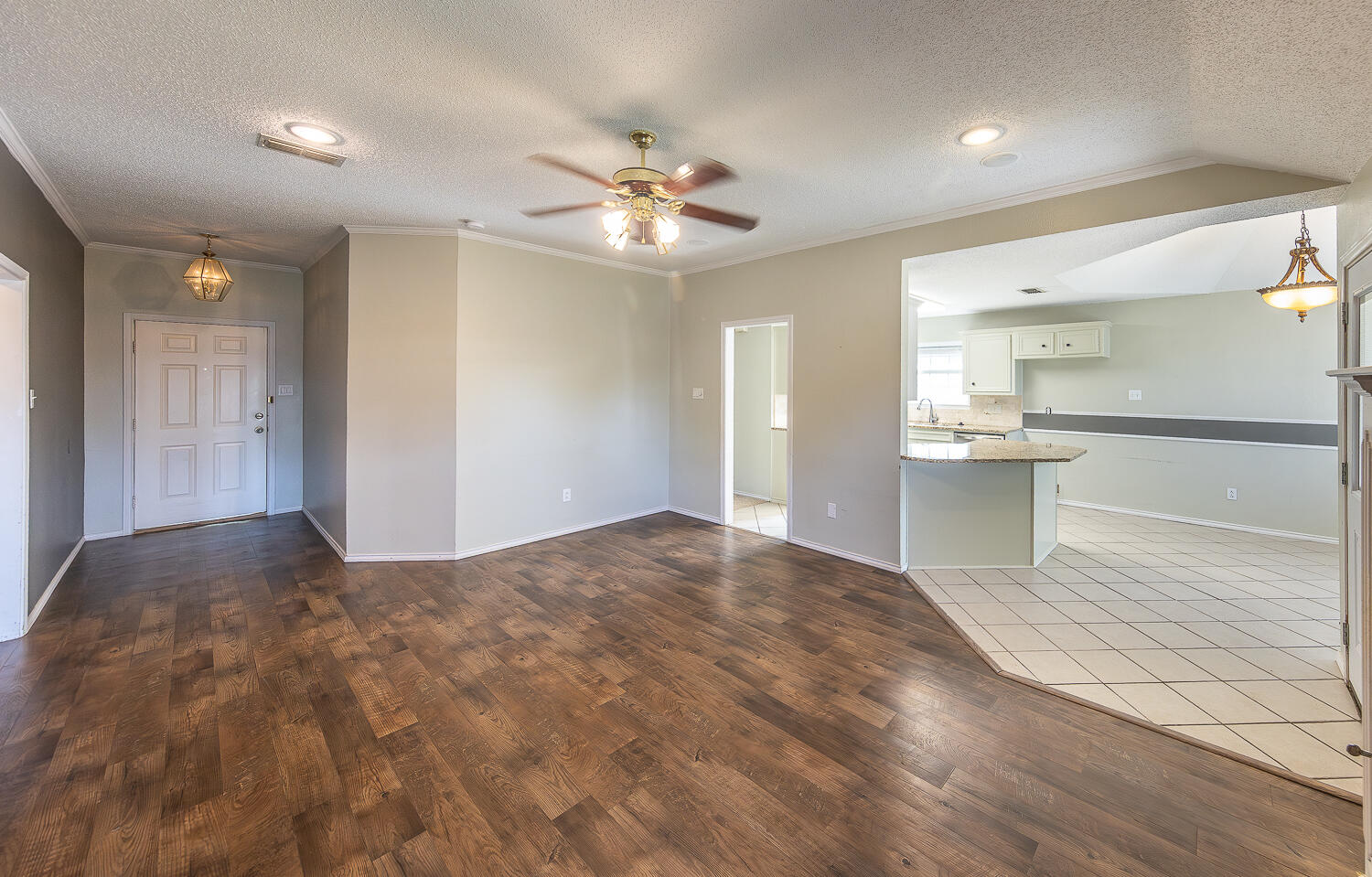 2923 85th Street Lubbock, TX 79423 - Photo 7 of 23 a view of a kitchen with a sink and cabinet