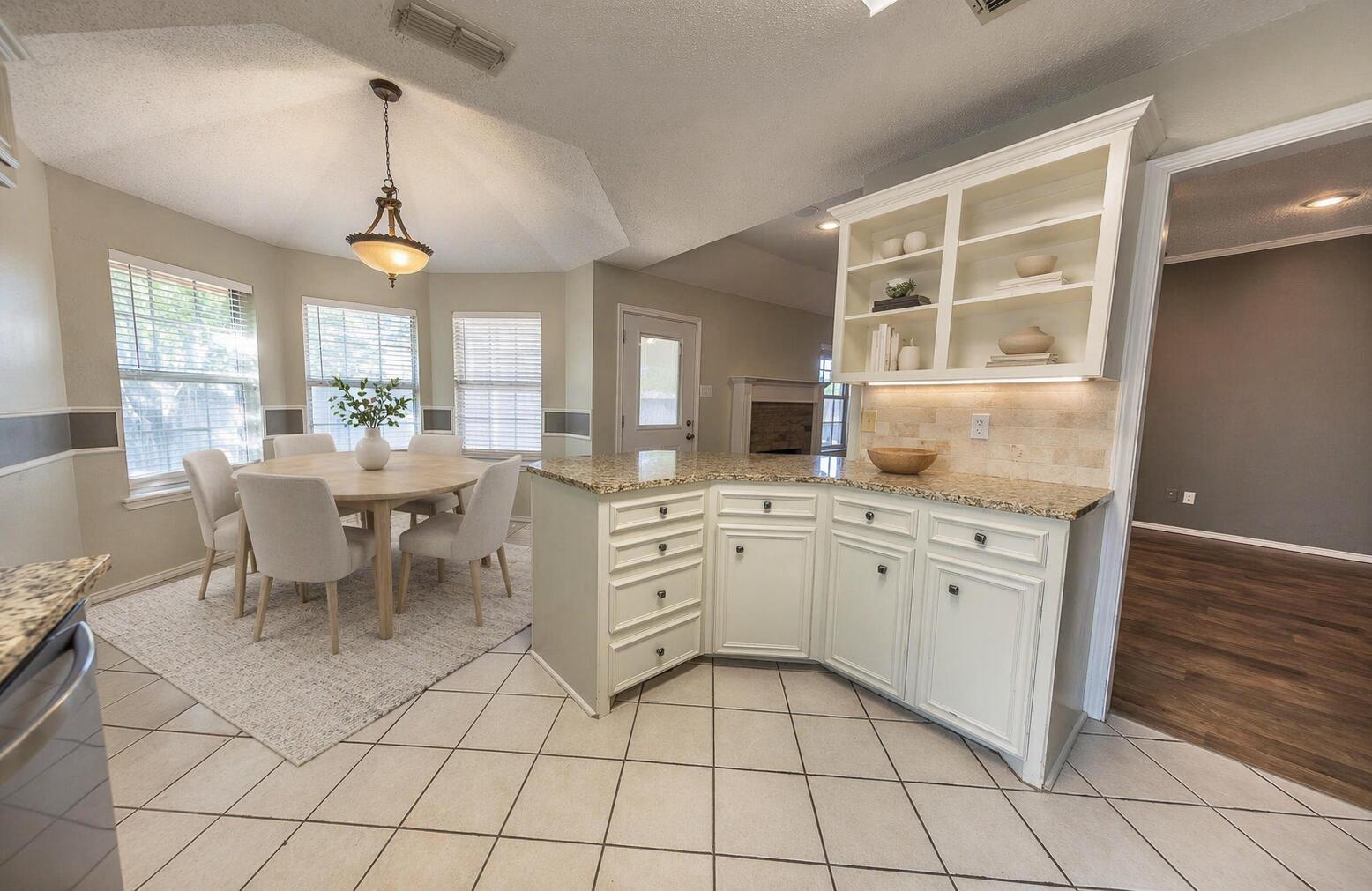 2923 85th Street Lubbock, TX 79423 - Photo 9 of 23 Bright and airy kitchen_dining nook