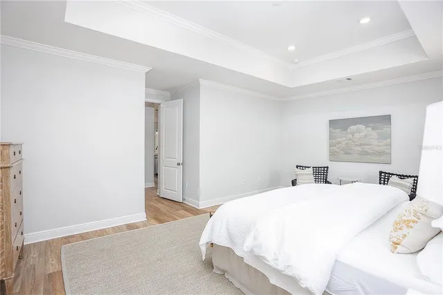 a bedroom with a bed and a table in it