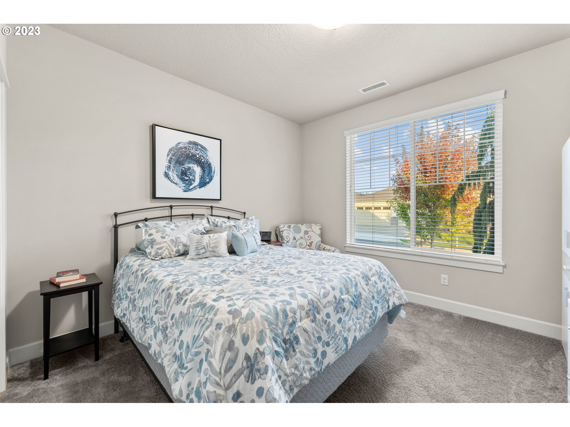 1851 South 47th Place Ridgefield, WA 98642 - Photo 17 of 31 a bedroom with a bed and a painting on the wall