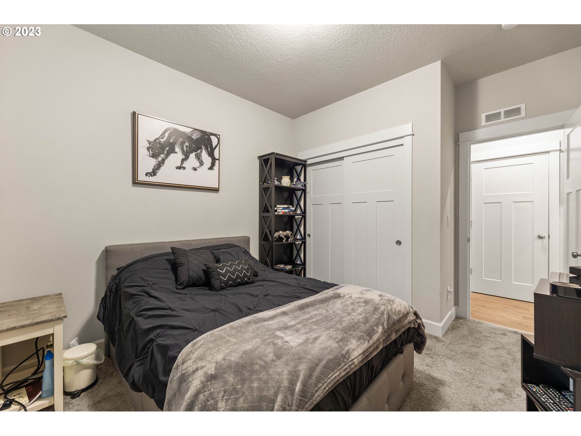 1851 South 47th Place Ridgefield, WA 98642 - Photo 25 of 31 a bedroom with a bed and a television