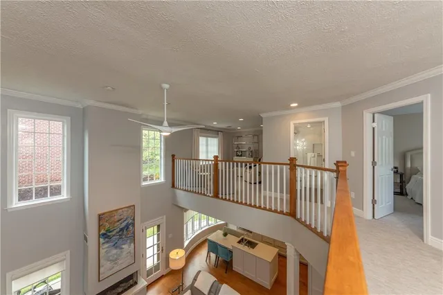 a view of a hallway with windows