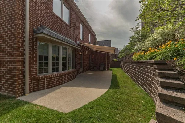 a view of a backyard with a garden