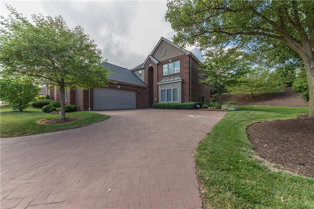 100 Prestonwood Lane Canonsburg, PA 15317 - Photo 27 of 33 a front view of a house with a yard and garage