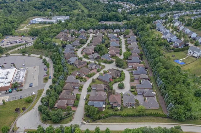 an aerial view of multiple house