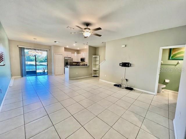 8606 Reedville Street New Port Richey, FL 34654 - Photo 11 of 85 a view of a electric appliances and windows in a room