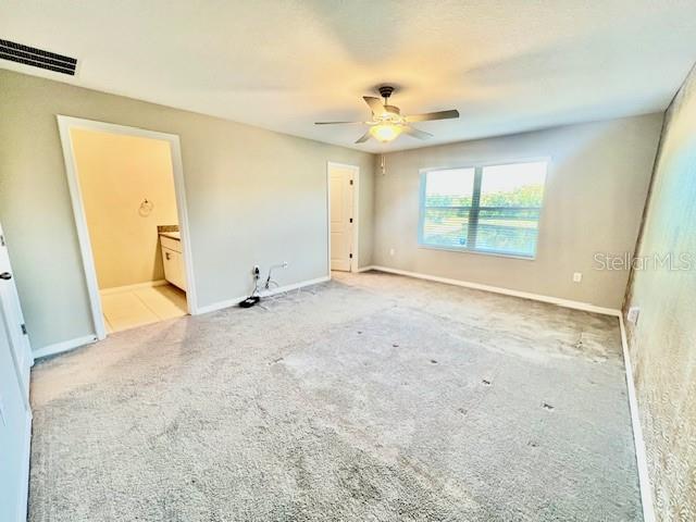 8606 Reedville Street New Port Richey, FL 34654 - Photo 27 of 85 a view of an empty room with a window