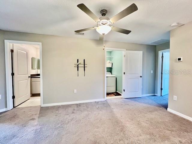 8606 Reedville Street New Port Richey, FL 34654 - Photo 38 of 85 an empty room with fan and windows