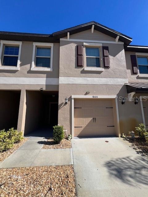 8606 Reedville Street New Port Richey, FL 34654 - Photo 55 of 85 a front view of a house with a yard