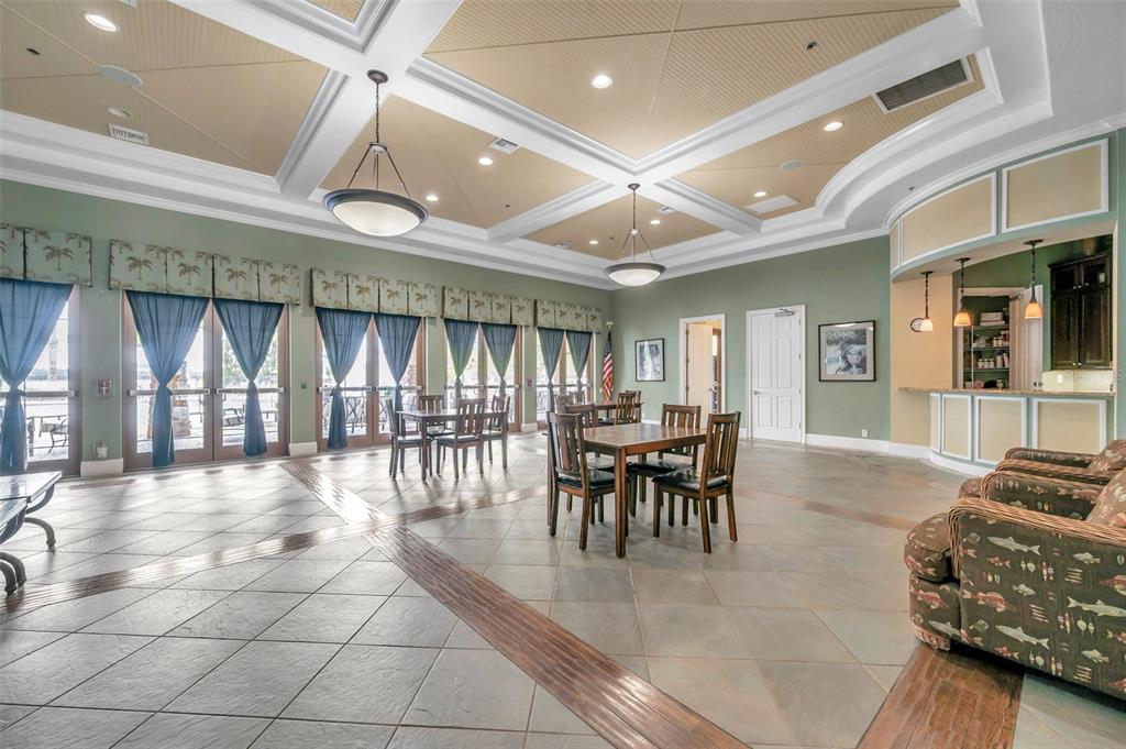 8606 Reedville Street New Port Richey, FL 34654 - Photo 67 of 85 a view of a dining room with furniture