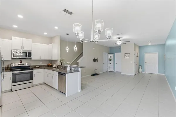 a living room with furniture and a table