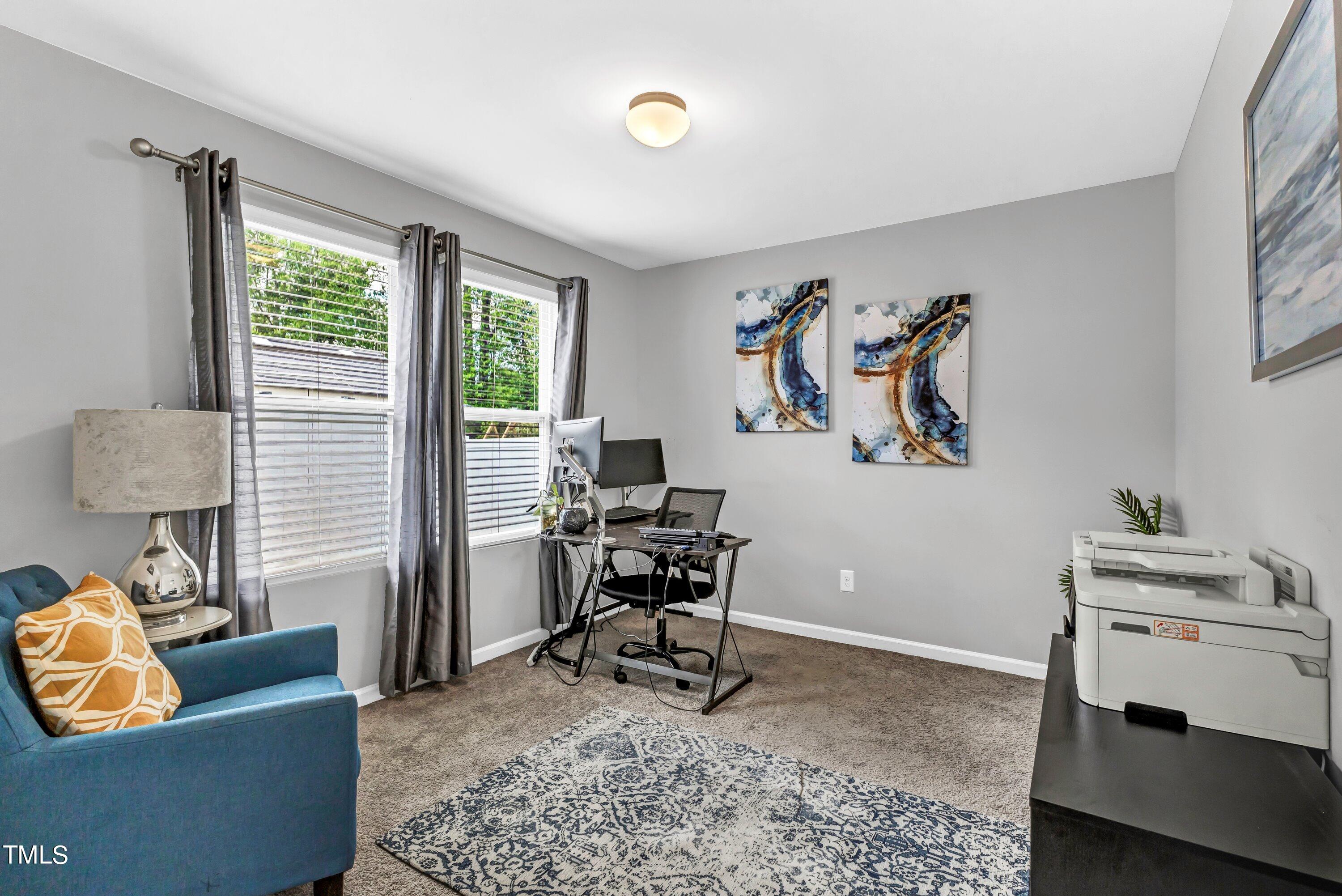 301 Connect Drive Wendell, NC 27591 - Photo 13 of 28 a living room with furniture and a window
